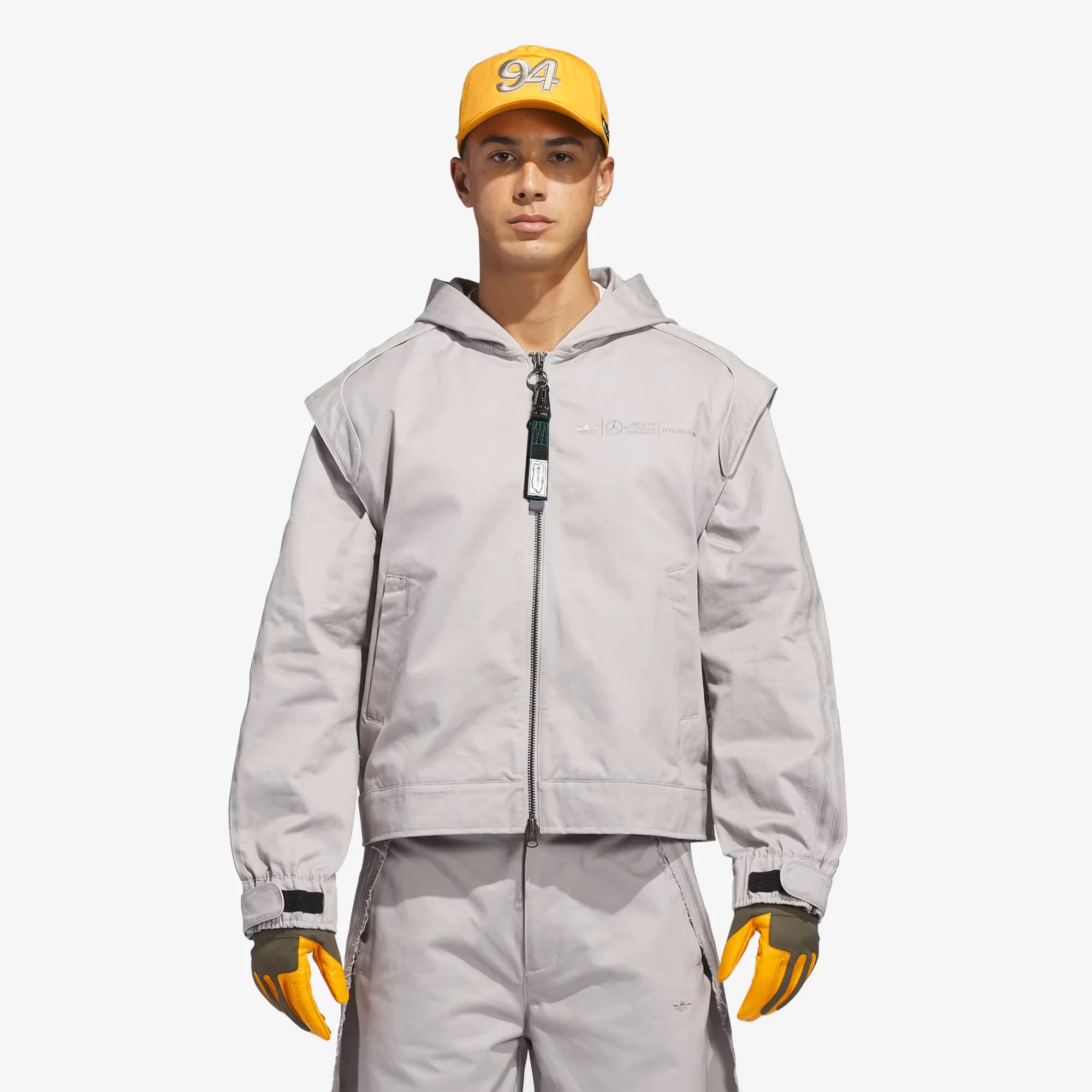 ADIDAS ORIGINALS | BAD BUNNY X MERCEDES - AMG PETRONAS FORMULA ONE TEAM ZIP UP TRACK TOP { CLEAR GRANITE