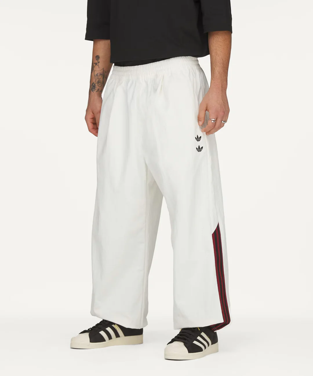 Adidas Originals | x CHAVARRIA WOVEN TRACK PANT { OFF WHITE