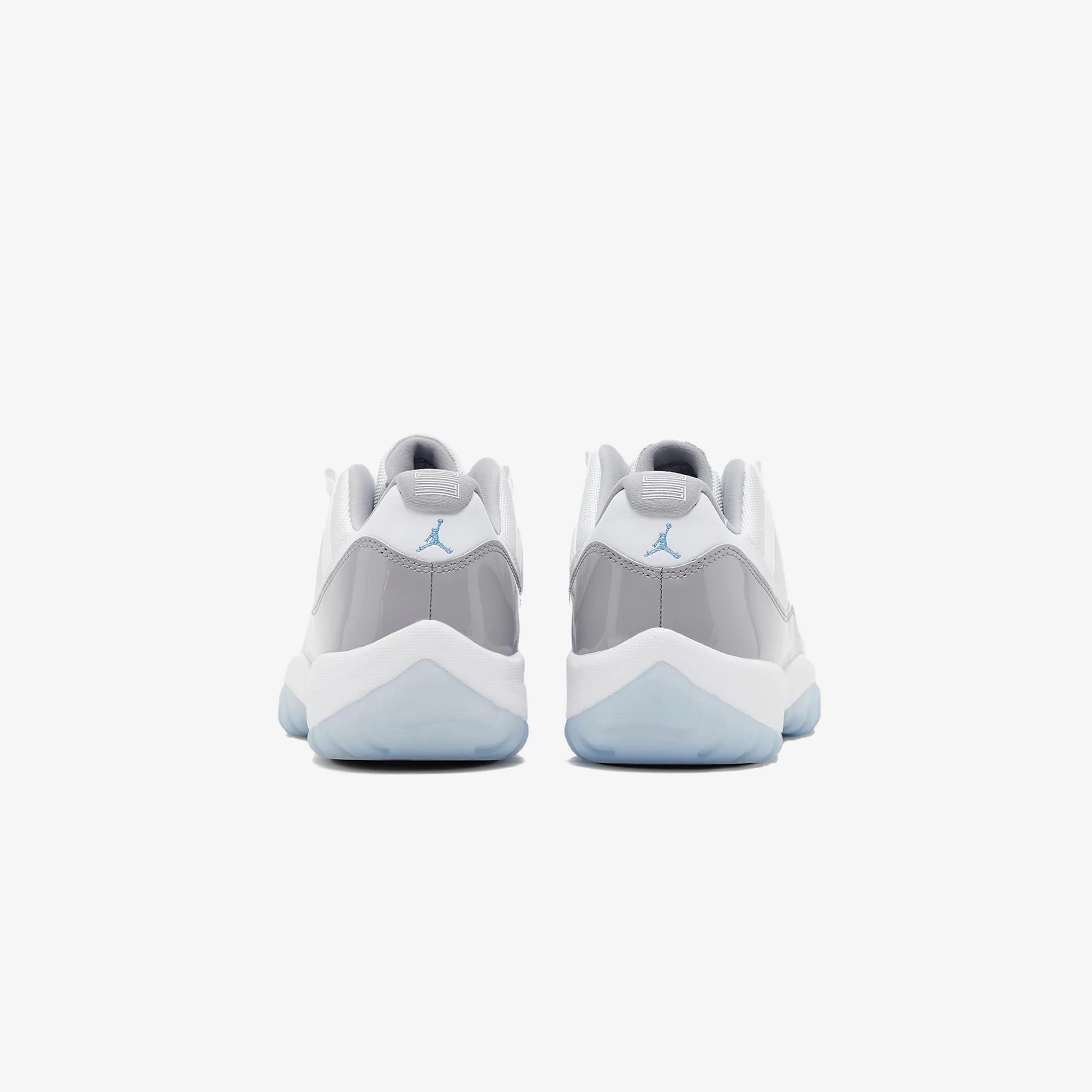 Jordan | AIR JORDAN 11 RETRO LOW { WHITE/UNIVERSITY BLUE-CEMENT GREY - Image 3