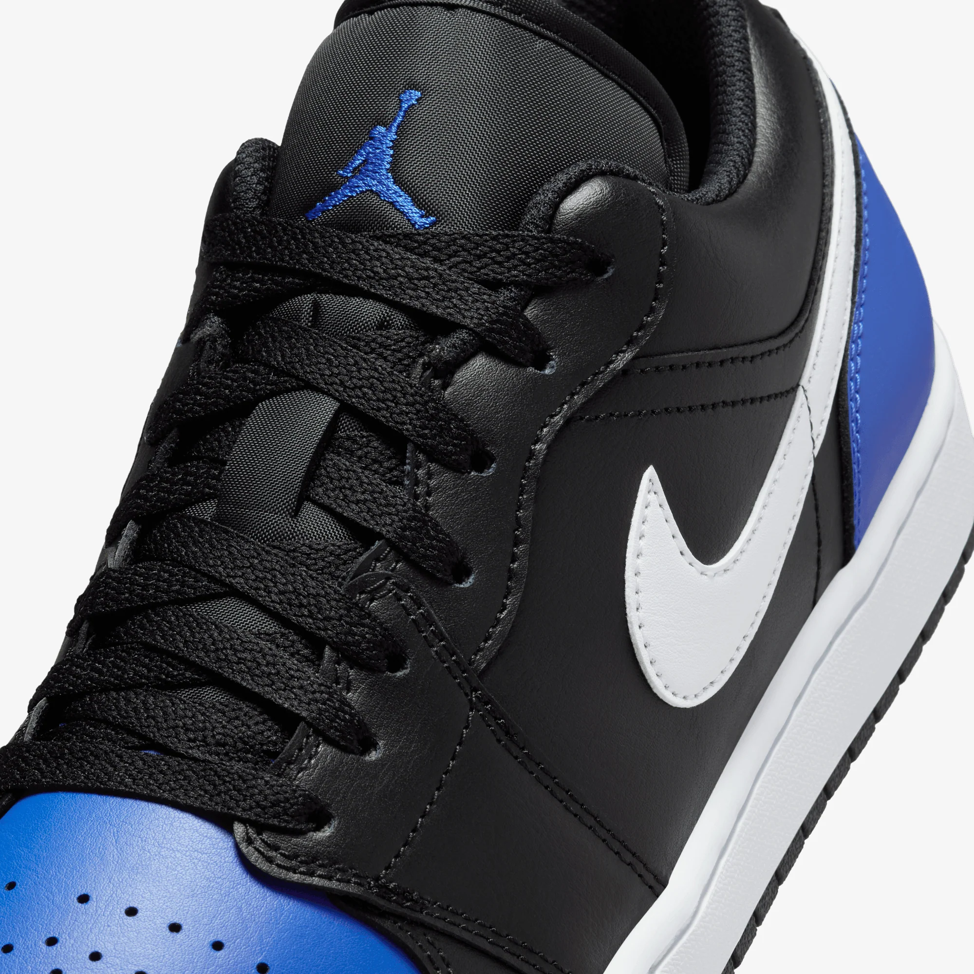 JORDAN | AIR JORDAN 1 LOW { BLACK/WHITE-GAME ROYAL - Image 4