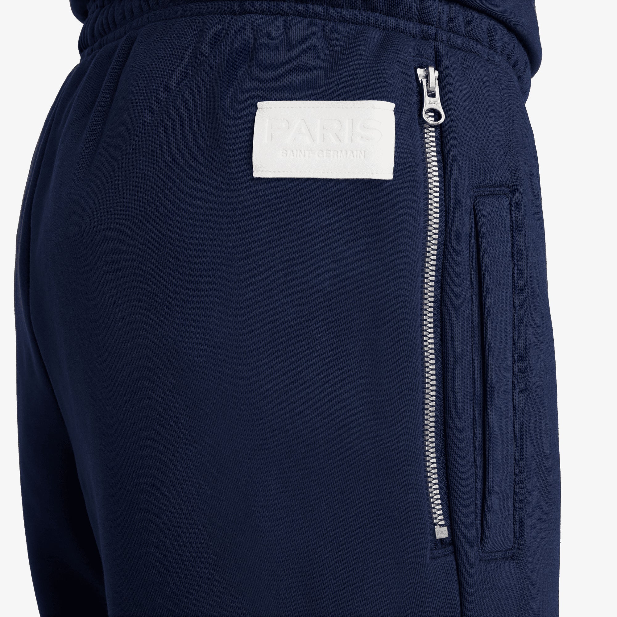 NIKE | PARIS SAINT-GERMAIN STANDARD ISSUE DRI-FIT SOCCER TAPERED PANT { MIDNIGHT NAVY/UNIVERSITY RED - Image 4