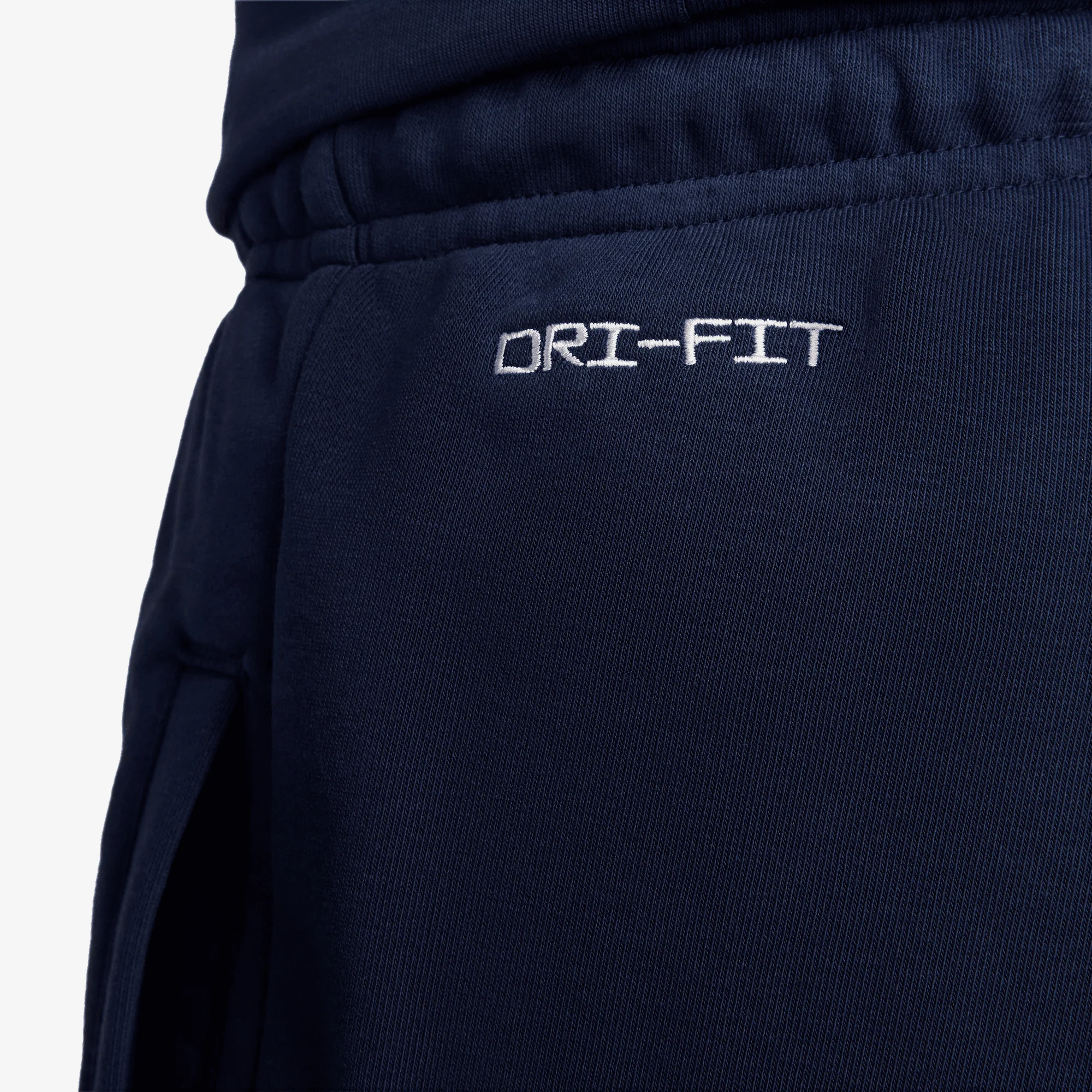 NIKE | PARIS SAINT-GERMAIN STANDARD ISSUE DRI-FIT SOCCER TAPERED PANT { MIDNIGHT NAVY/UNIVERSITY RED - Image 6