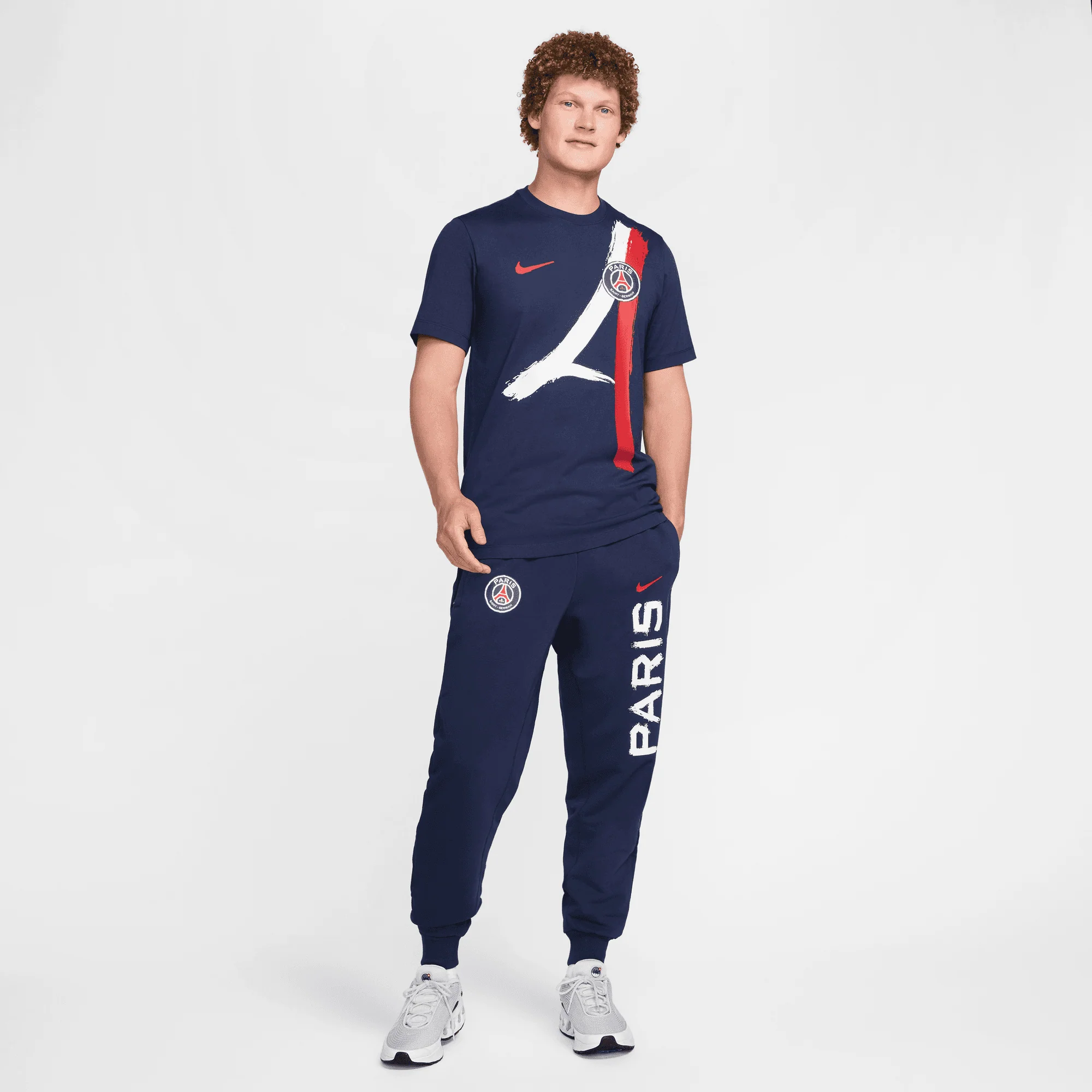 NIKE | PARIS SAINT-GERMAIN STANDARD ISSUE DRI-FIT SOCCER TAPERED PANT { MIDNIGHT NAVY/UNIVERSITY RED - Image 7